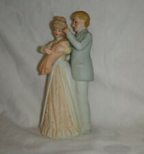 Porcelain Figurine Mother Baby Father picture
