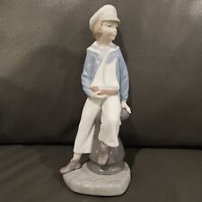 LLADRO 4810 FIGURE OF SAILOR BOY WITH YACHT picture
