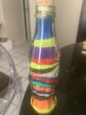COCA COLA 8 oz Collector's Item Rainbow Colored Sand Home Decor Art Glass Bottle picture