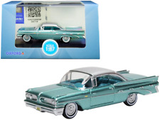 1959 Pontiac Bonneville Coupe Seaspray Green with Silver Top 1/87 (HO) Scale Die picture