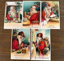 Lot of 5 SANTA CLAUS ~with Pipe~in Workshop~Toys~Antique Christmas Postcards Set picture